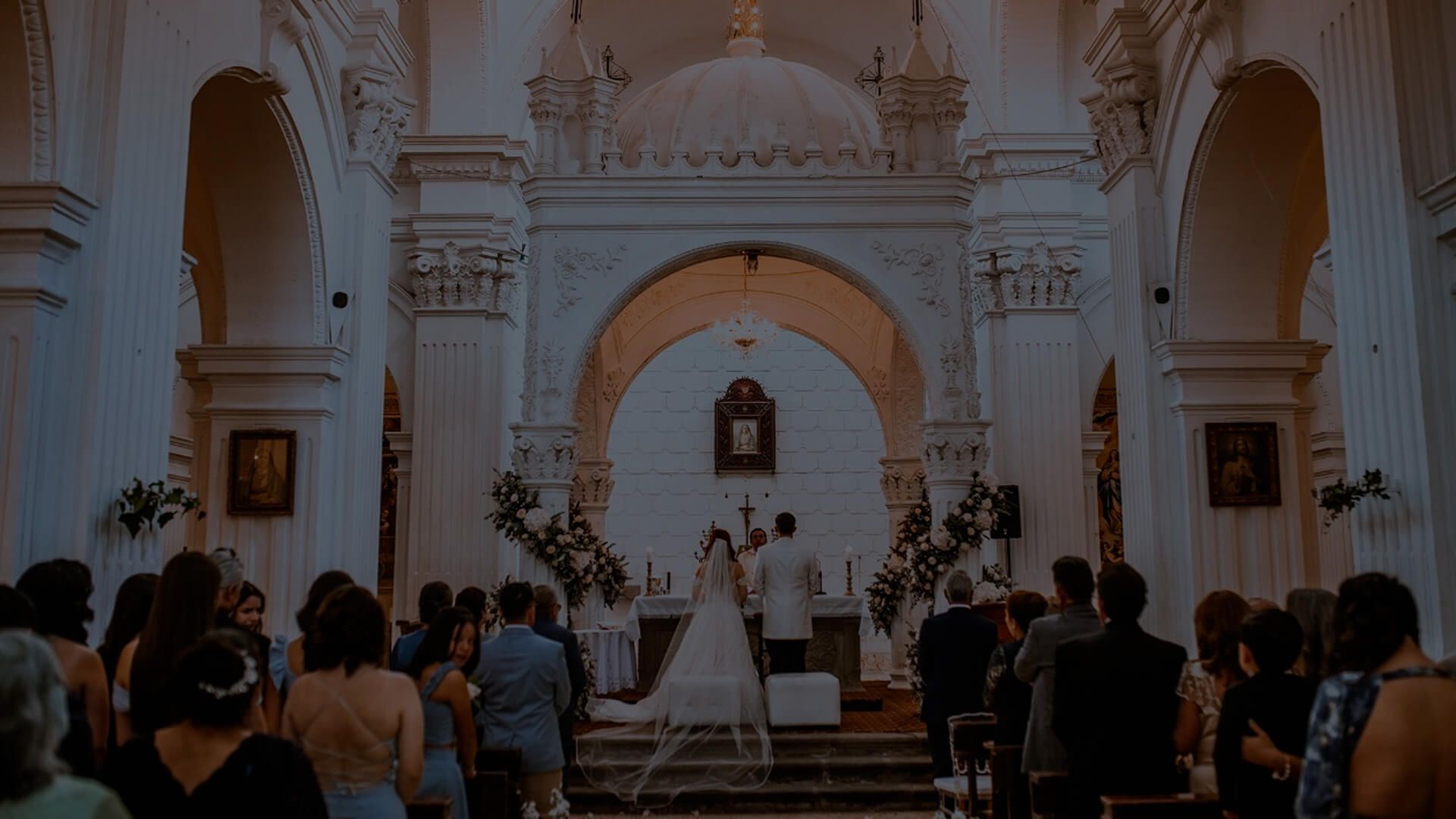Ceremony in a white arched church